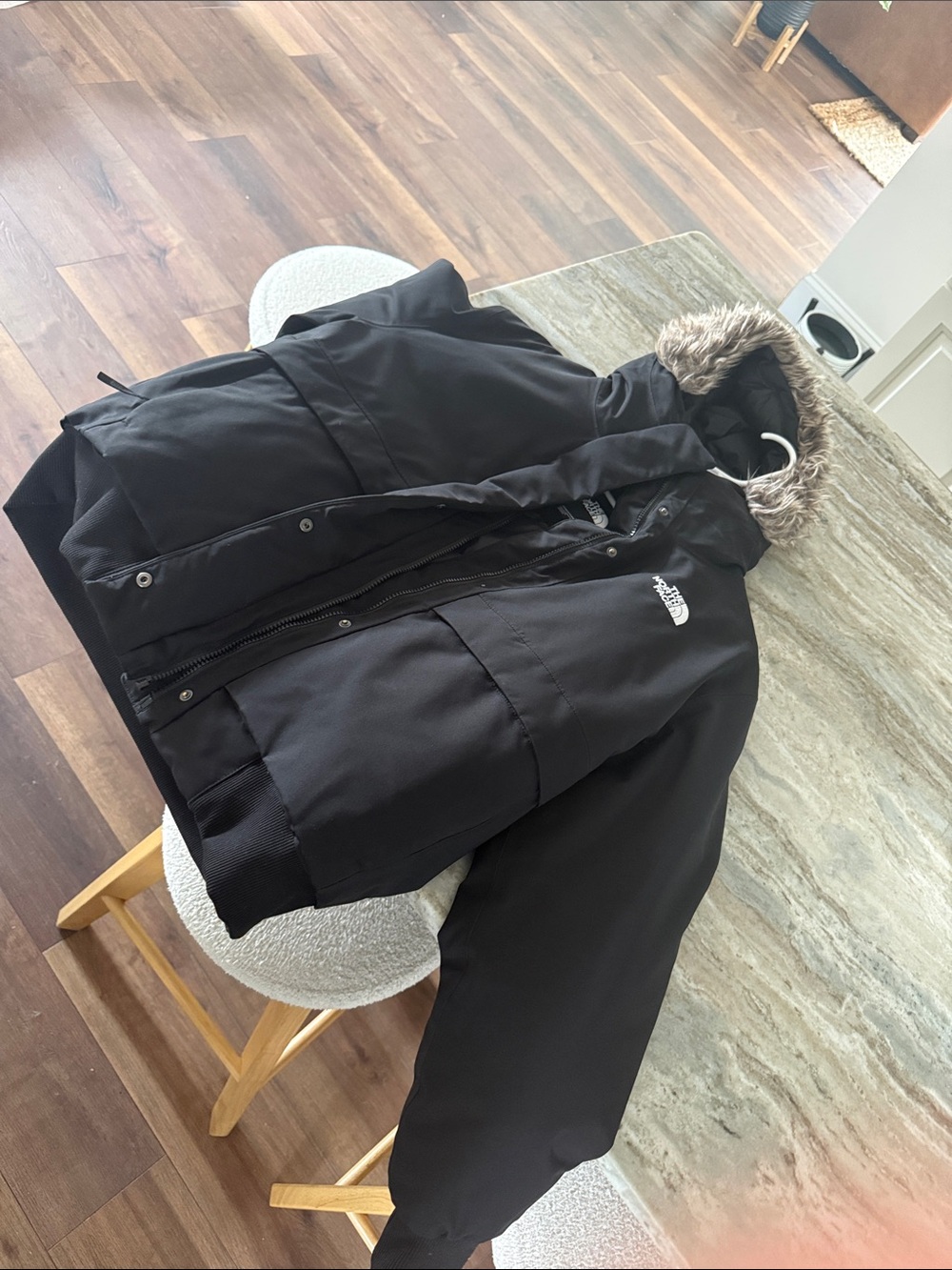 The North Face Men's Black Hooded Puffer Jacket with Faux Fur Trim
